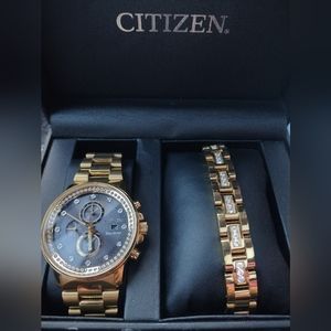 Men's Citizen brand gold and diamond watch and bracelet set.
